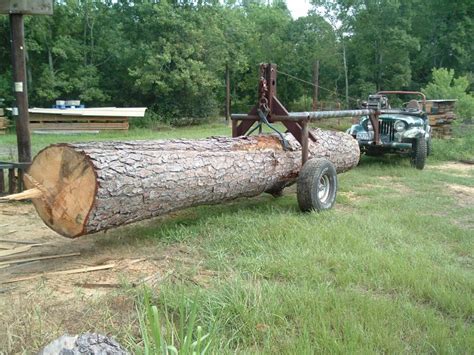 moving logs with skid steer|How to move logs .